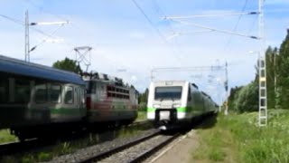 preview picture of video 'Finland: VR Class Sr1 electric loco and Sm3 Pendolino passenger services pass at Tervola station'