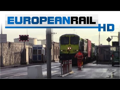 Irish Rail 201 loco 218 + IWT passes East Wall Road