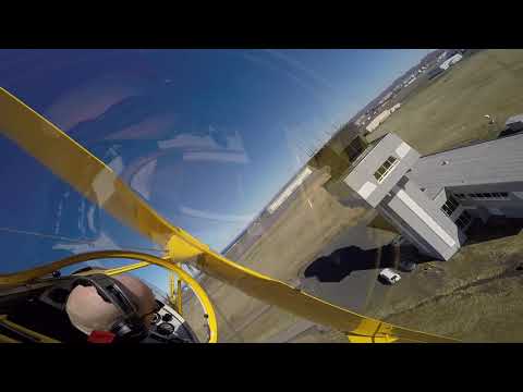 Pitts Special Tower Flyby in a Traffic Pattern at an International Airport