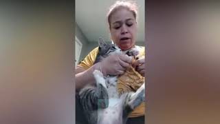 Cat Hisses At Woman While She Cuts His Nails