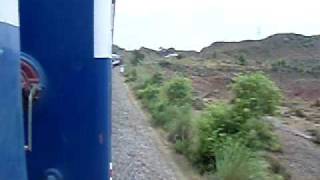 preview picture of video 'Pakistan Railway Train (Islamabad Express) coming out of a Tunnel'