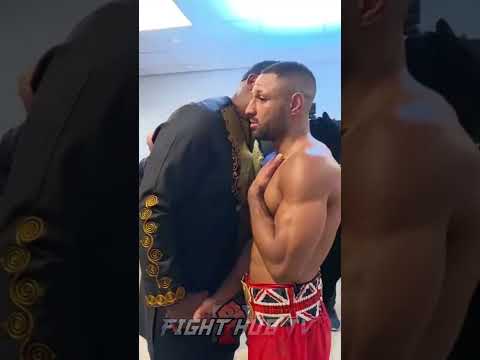 DERECK CHISORA CONGRATULATES KELL BROOK ON STOPPING AMIR KHAN. WHISPERS SWEET NOTHINGS IN HIS EAR