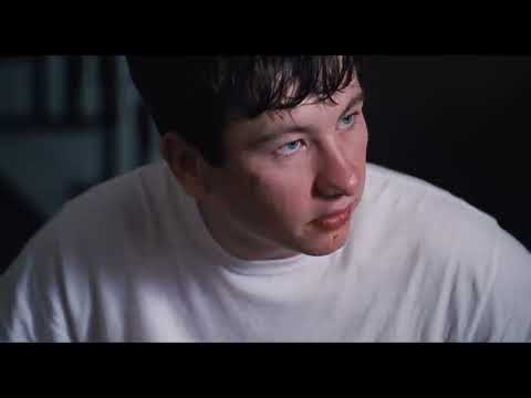 Trailer collage: surgical lights, suburban interiors, and a slow pan toward a motionless teenager