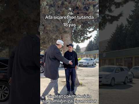 Ata siqaretnən tutanda