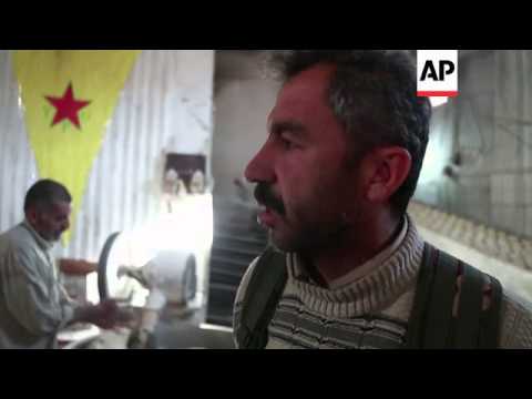 The Syrian town of Kobani is in ruins but some civilians remain.  After more than two months of figh