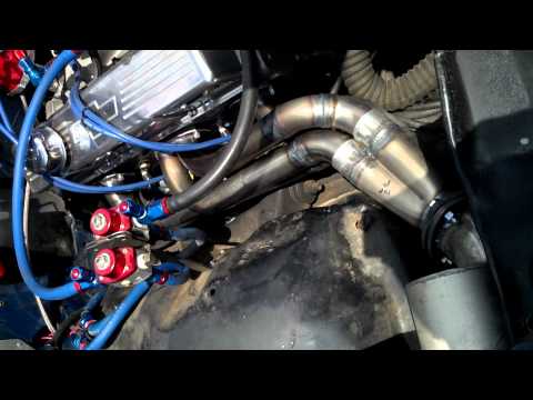 Ashley's new front exit headers with mufflers