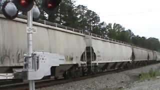 preview picture of video 'Norfolk Southern mixed freight train northwest through Powder Springs Ga.'