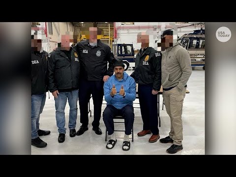 Venezuelan President Nicolas Maduro and wife Celia Flores seen in DEA custody