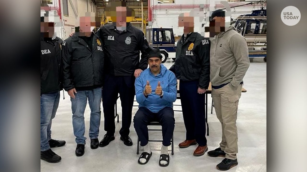 Venezuelan President Nicolas Maduro and wife Celia Flores seen in DEA custody