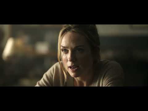 Close-up of Brad Pitt as Sonny Hayes in F1, cockpit view