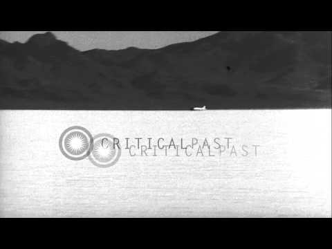 Captain George Eyston's car during its 347 miles per hour runs on a sandy beach, ...HD Stock Footage