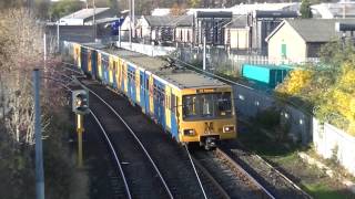 preview picture of video 'Tyne and Wear Metro-Metrocars 4024 and 4066 passing Gosforth Depot East Yard'