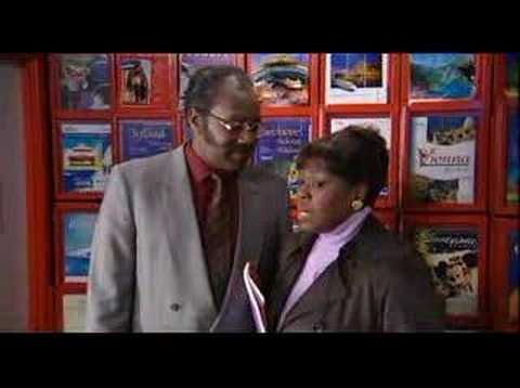 Donovan and Mrs Johnson in the travel agent