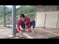 Hoang assembled boards to prepare to fence the house and his family's new life.