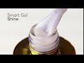 FOX Smart gel Shine - liquid gel for strengthening the nail plate (white translucent with glitter), 12 ml FOX Smart gel Shine - liquid gel for strengthening the nail plate (white translucent with glitter), 12 ml