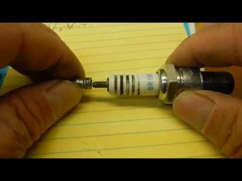 What happens when no threadlock is applied to a spark plug terminal