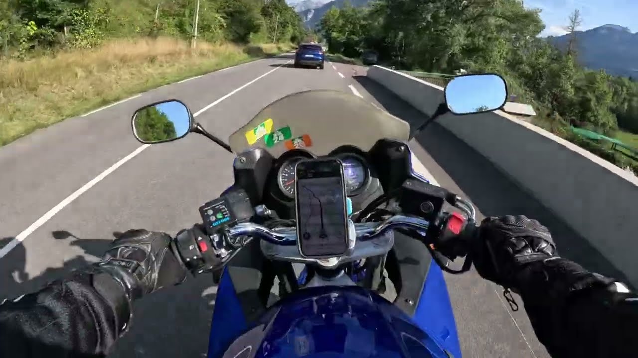 Motorcycle POV riding in French Alps
