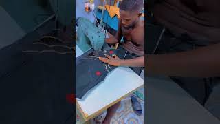 The making of black embroidery agbada