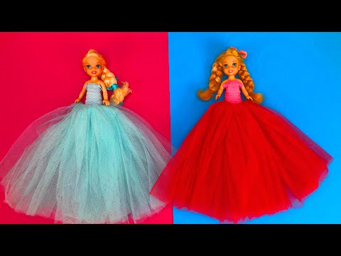 Elsa and Anna toddlers surprise clothes in a box