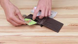 Шкіряний чоловічий затискач для грошей з монетницею Grande Pelle 11547 коричневий