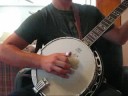 Drake playing the Banjo.
