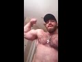 Comedian Bodybuilder Muscle Hairy beast Flex's while cooking