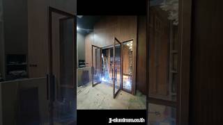 ประตูบานสวิงคู่พร้อมช่องแสงลายไม้วอลนัท