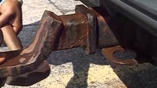Removing the rusty hitch from a 1994 GMC Suburban using vinegar Part 2