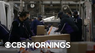 Norah O'Donnell gets an exclusive look inside FedEx shipping facility