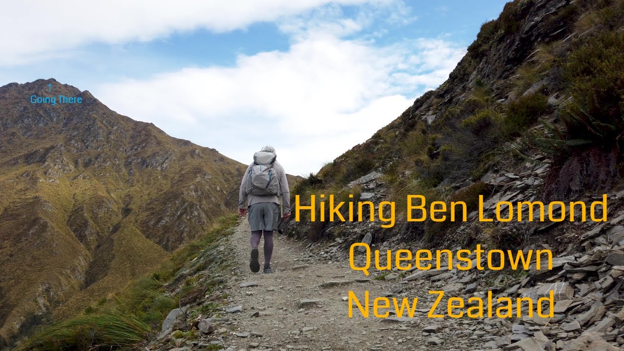A traveler embarks on a hike along the Ben Lomond track.