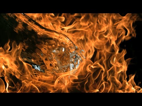 Slow Motion Fire vs Water Pouring on Burning Flames with Mirror After Effects in HD 1080p Video Clip