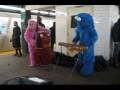 Cookie Monster And Pink Planet Of The Ape Rock Out In The Subway