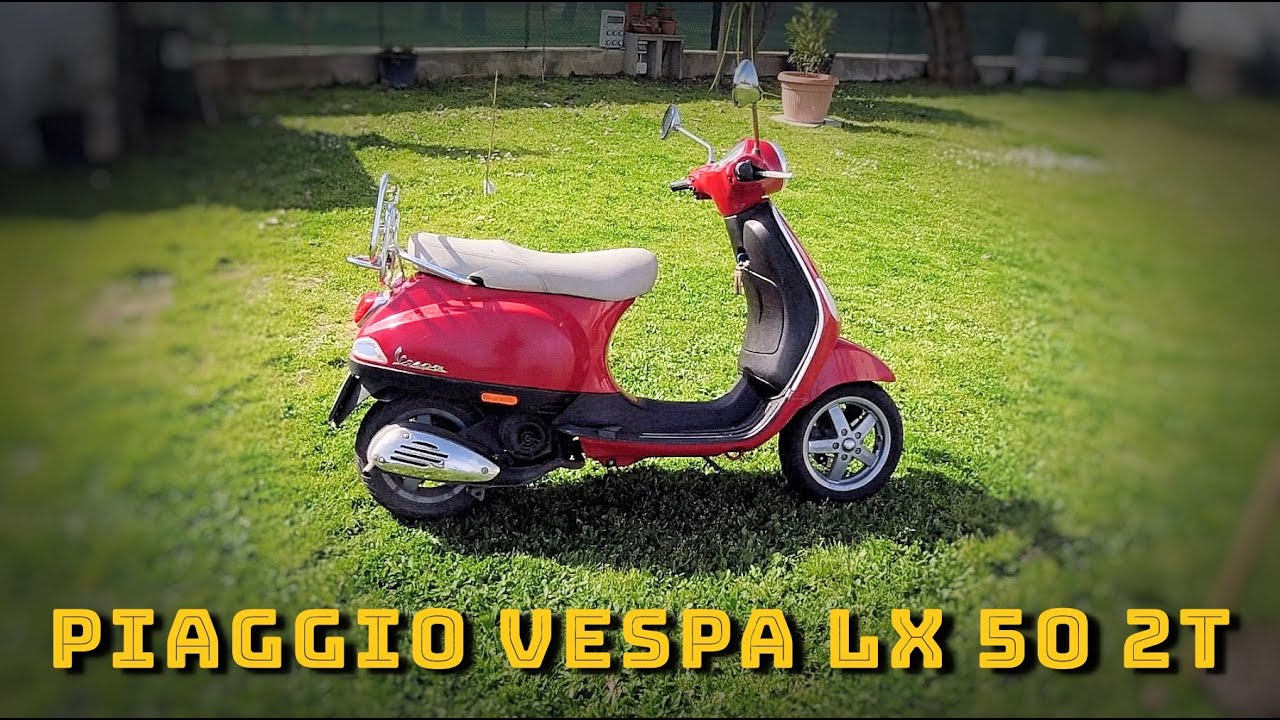 Vespa primavera 50 rouge+ top case