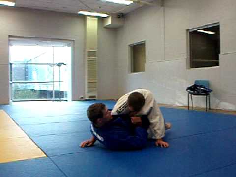 Straight armwrap Armlock from Guard