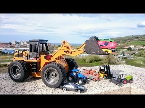 Excavator of construction loader. Video of radio control toys for children