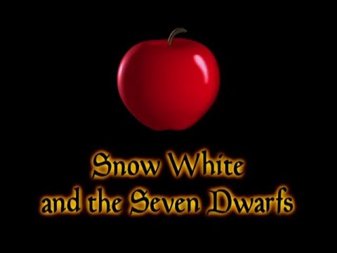 Trailer frame: the dwarfs march across a log as the remastered chorus rings out