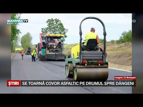 Se toarna covor asfaltic pe drumul spre Dangeni