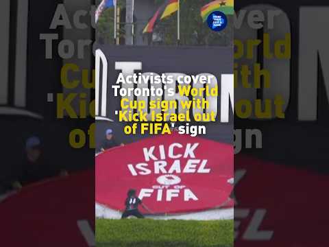Activists cover Toronto's World Cup sign with 