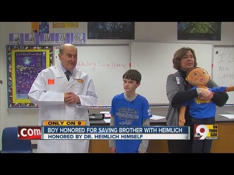 Boy honored for saving brothers life by inventor of Heimlich maneuver