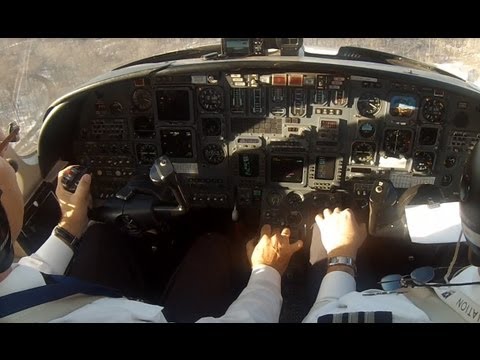 Windshear during approach in a Citation V at KHPN