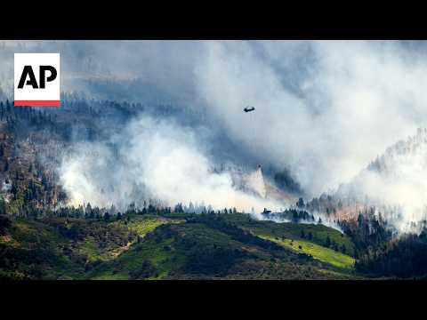 Winds hamper crews as fast-moving wildfire in Utah burns through forests