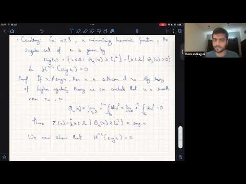 Singular sets of energy minimizing maps