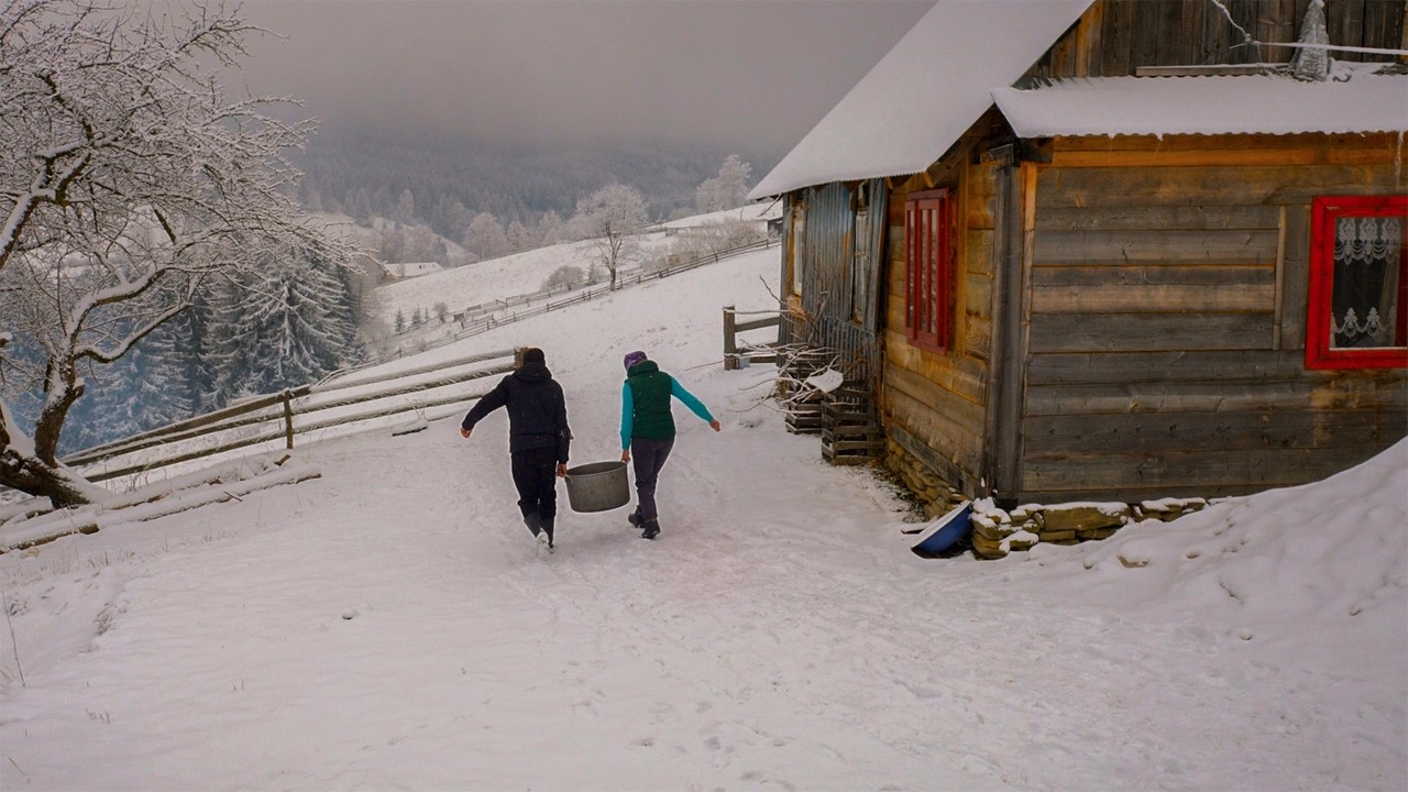 Family's Remote Lifestyle: Mastering the Art of Smoking Ham in the Mountains
