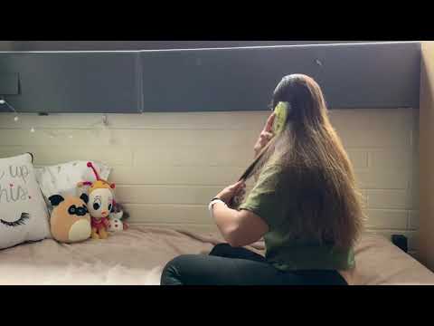 girl brushes hair