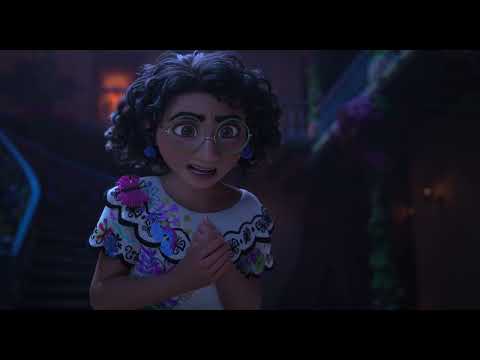 Encanto official trailer still showing the Madrigal family gathered in Casa Madrigal