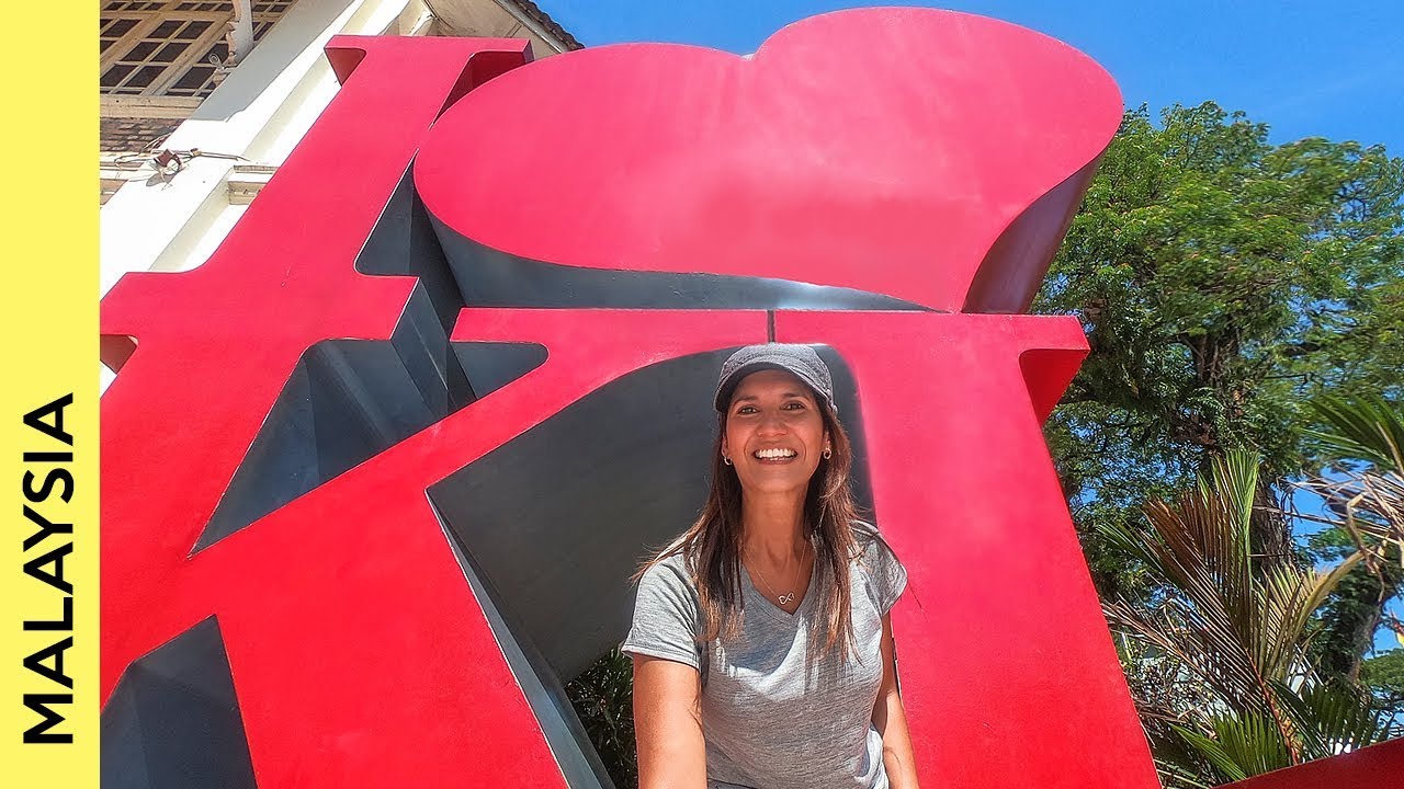 Join a traveler on a captivating exploration of Merdeka Square.