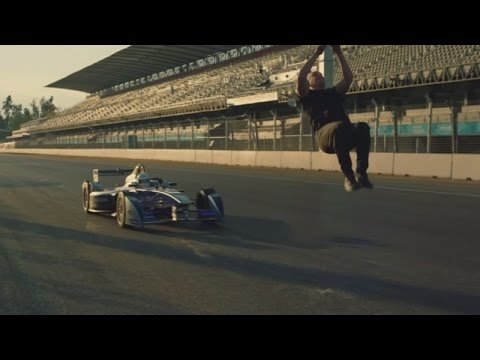 Stuntman backflips over Formula car travelling 97km p/h