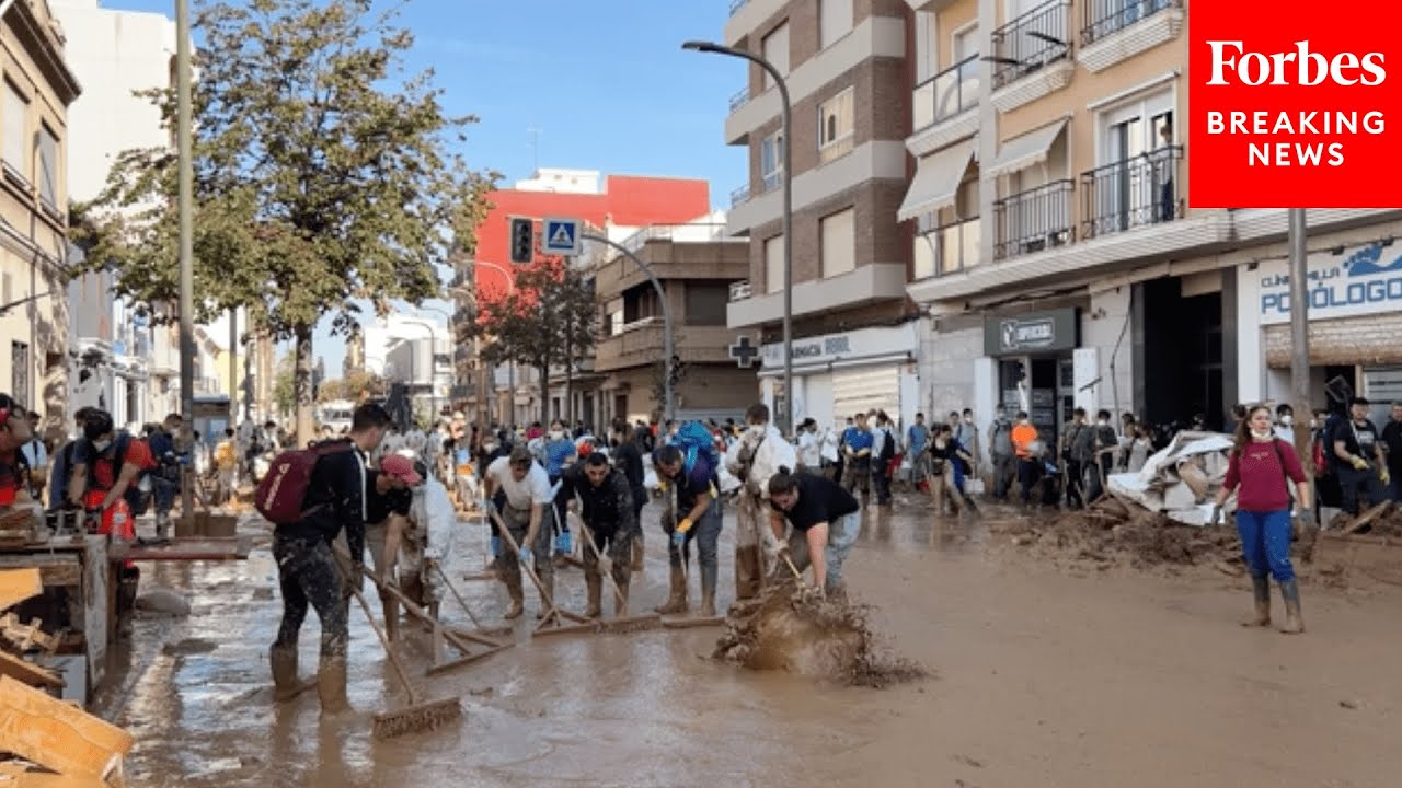 Volunteers In Massanassa Clean Up From The Aftermath Of Record Level Flooding In Spain