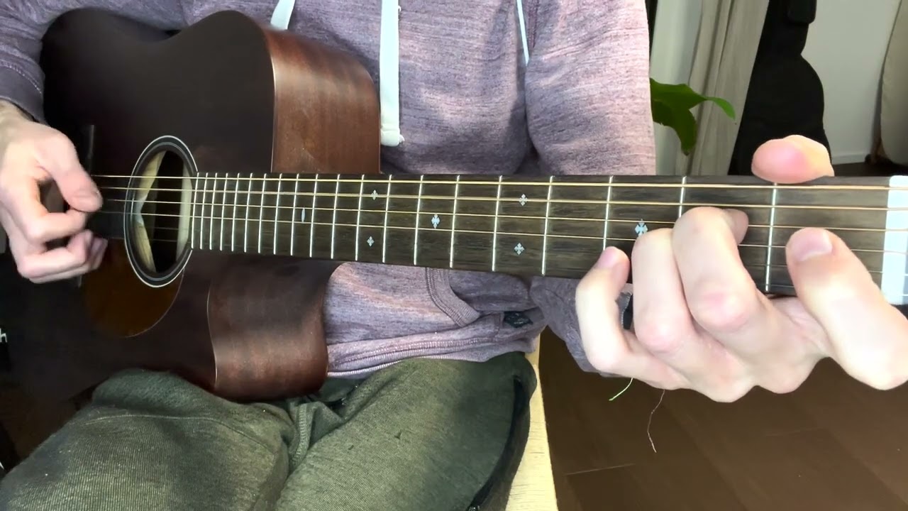 Roberto Barlocci playing the Street Spirit fingerpicking arpeggio on guitar.