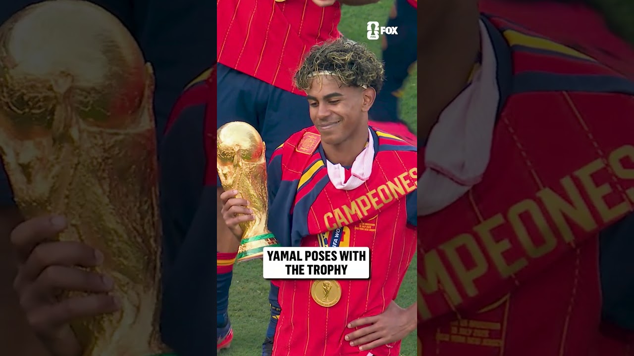 Lamine Yamal celebrating with the trophy after Spain won the 2026 World Cup